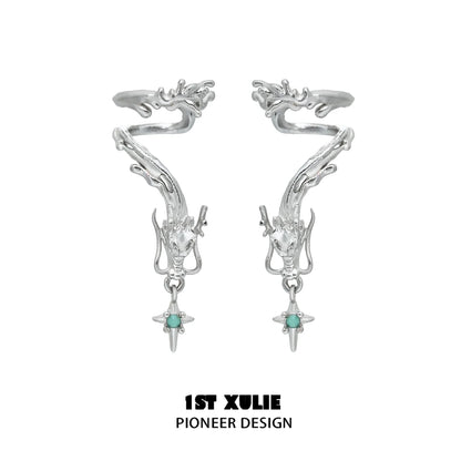 Intricate 1STXULIE dragon ear cuff jewelry with silver finish and turquoise accents