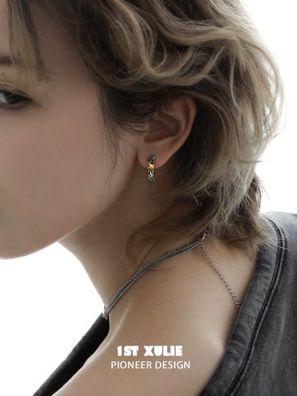 Edgy love letter earrings in a stylish design, perfect for adding flair to any outfit