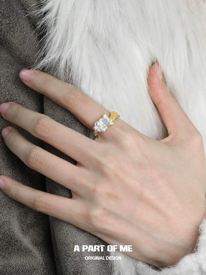 A PART OF ME feather rose engraved ring featuring a delicate floral design and gold accents