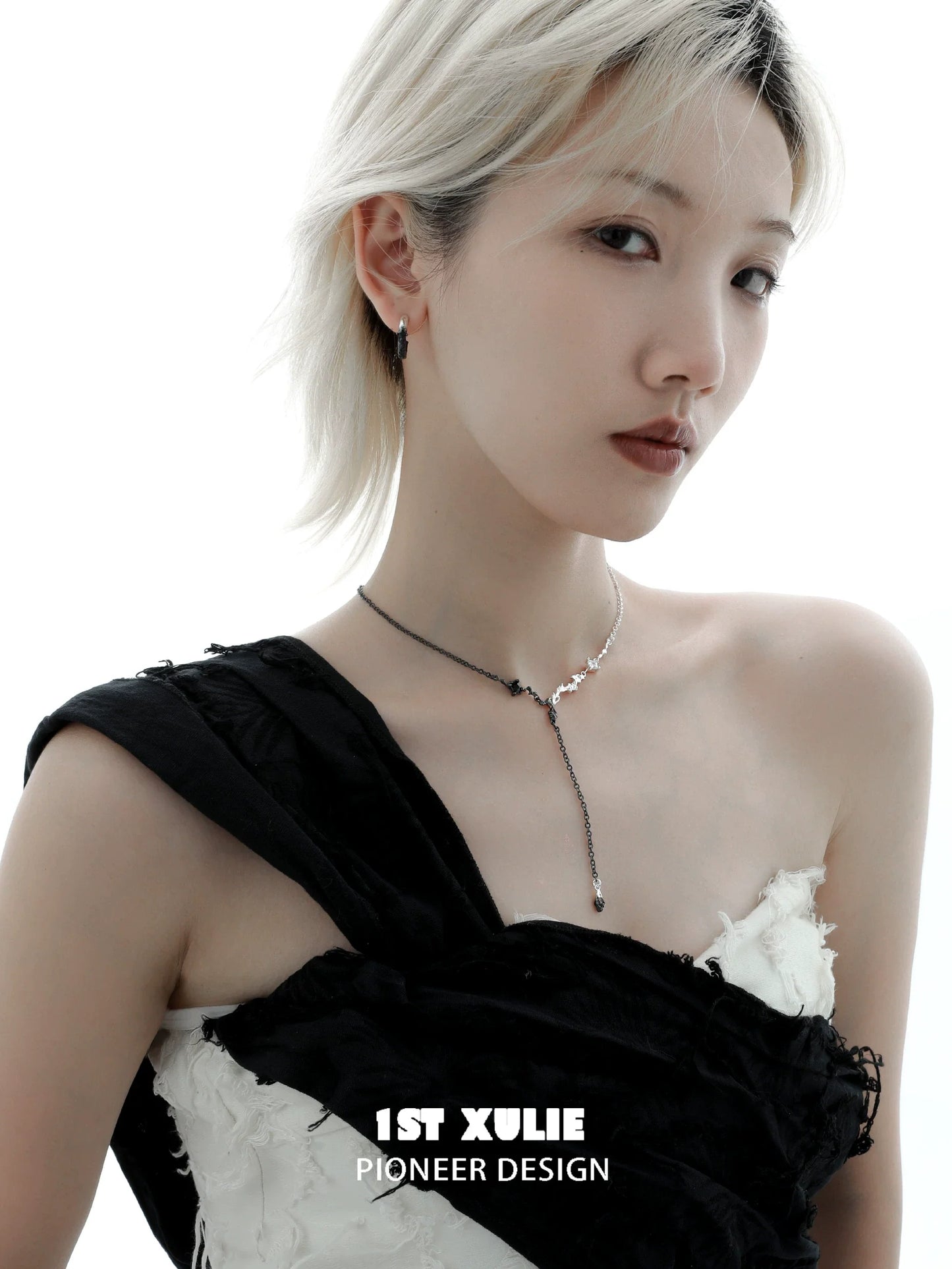 Stylish model wearing an Eternal Flame couple necklace with unique design for romantic couples