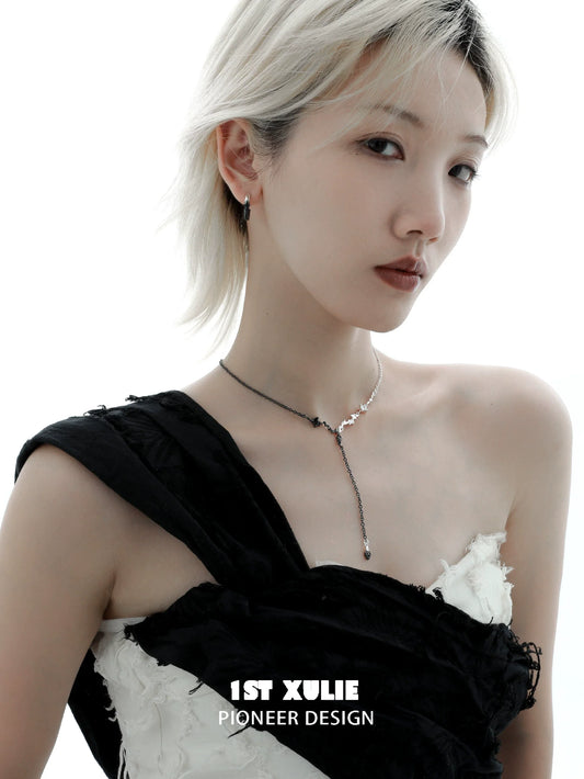 Stylish model wearing an Eternal Flame couple necklace with unique design for romantic couples