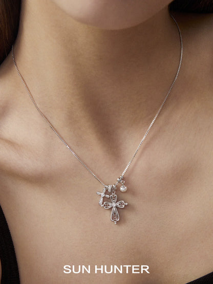 SUN HUNTER faith charm necklace featuring a delicate design with sparkling embellishments