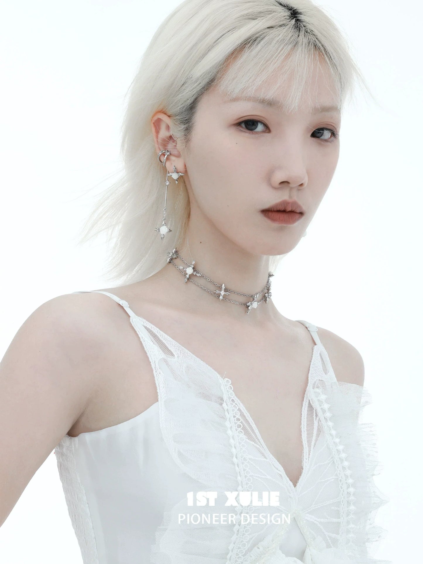 Faithful rose cross necklace showcased on a model wearing a stylish white outfit