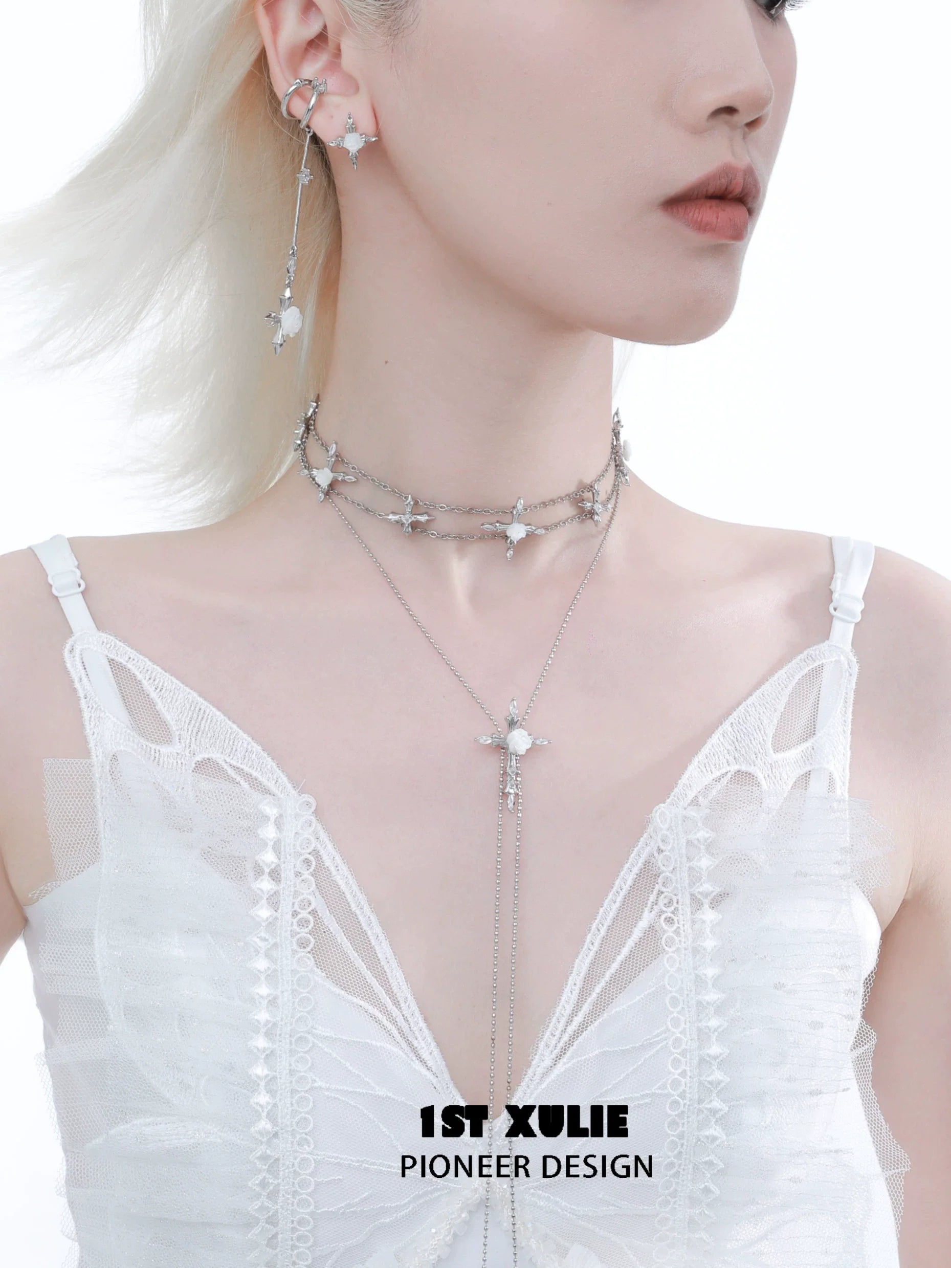1ST XULIE Faithful Rose Cross Necklace with Silver Chains and Star Accents on a Model