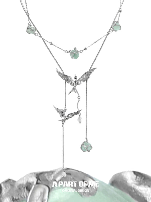 Flying bird fluorite necklace by A PART OF ME featuring delicate bird charms and sparkling fluorite accents