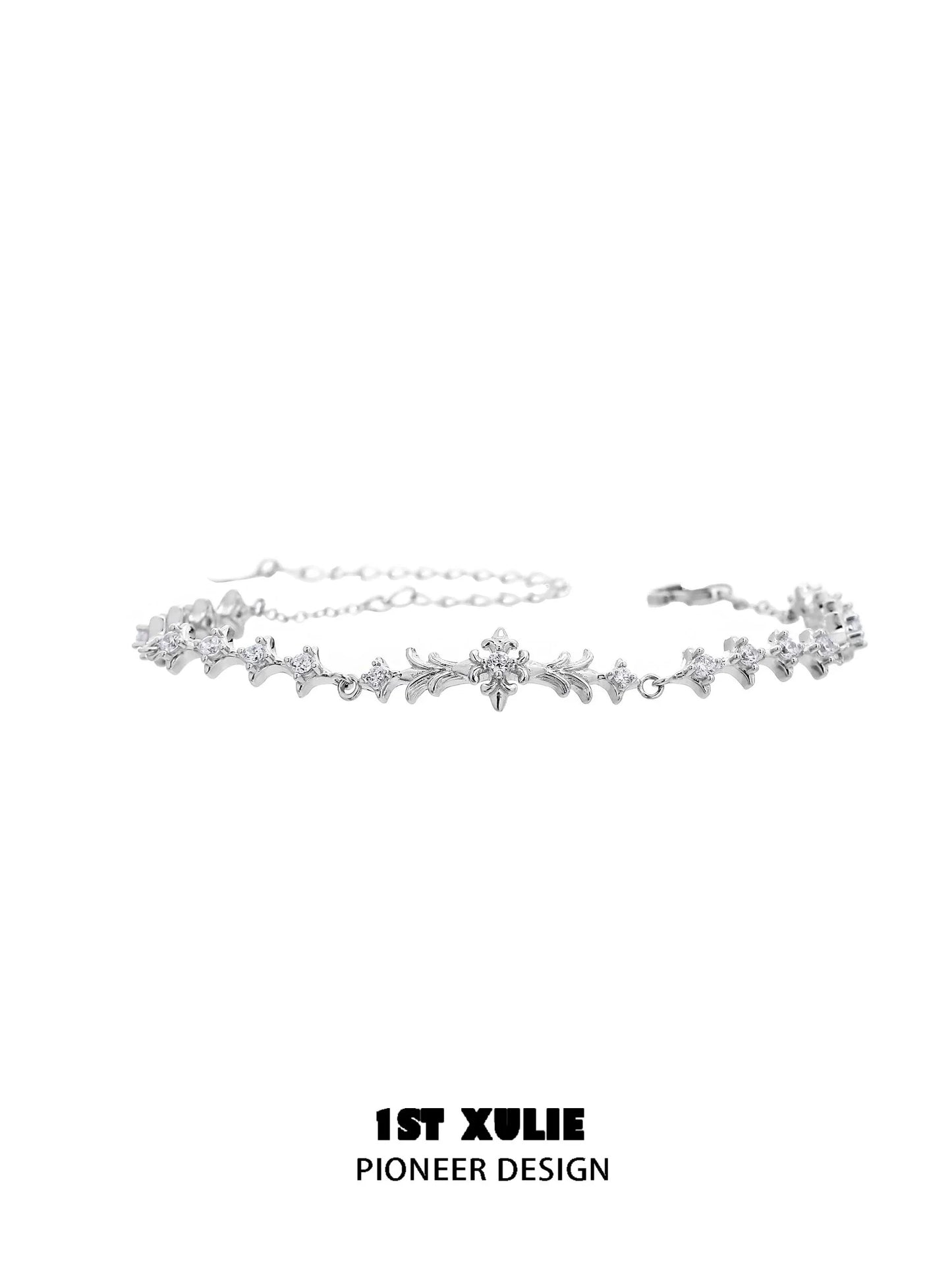 Elegant four-point star silver bracelet with sparkling accents for a stylish look