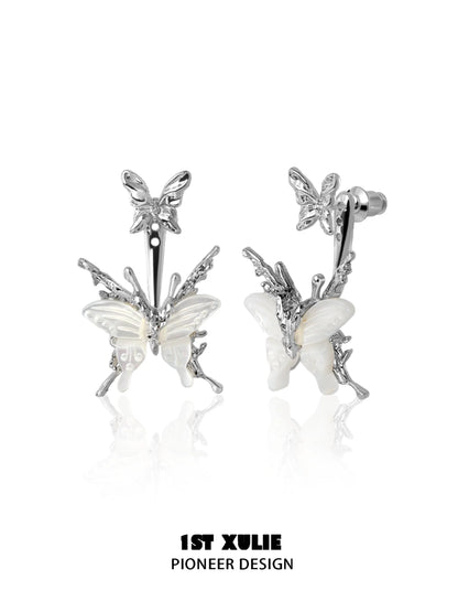 Futuristic butterfly earrings with silver detailing and intricate designs for a unique look