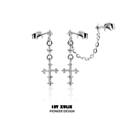 Futuristic cross chain earrings with sparkling details for a modern style statement