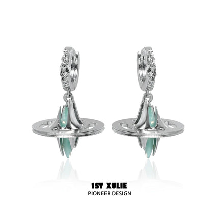Futuristic dream core earrings by 1ST XULIE featuring silver design and teal accents