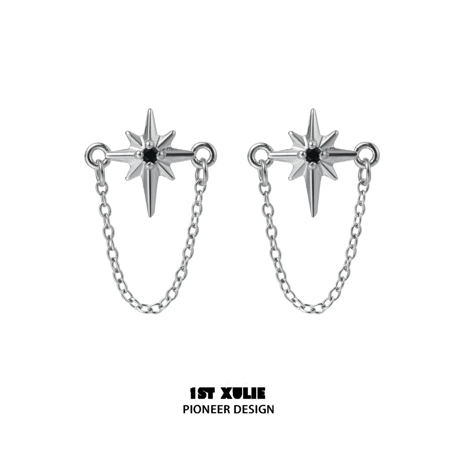 Futuristic star chain earrings in silver with striking star design and connecting chain