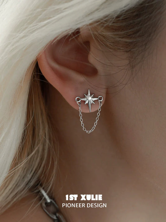 1ST XULIE futuristic star chain earrings in silver, featuring a unique star and chain design