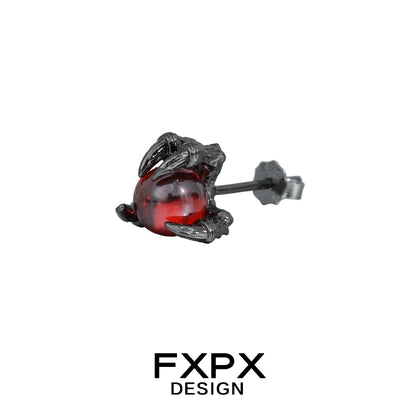 FXPX bloody dragon claw gothic earrings featuring black metal claw holding a red orb stud
