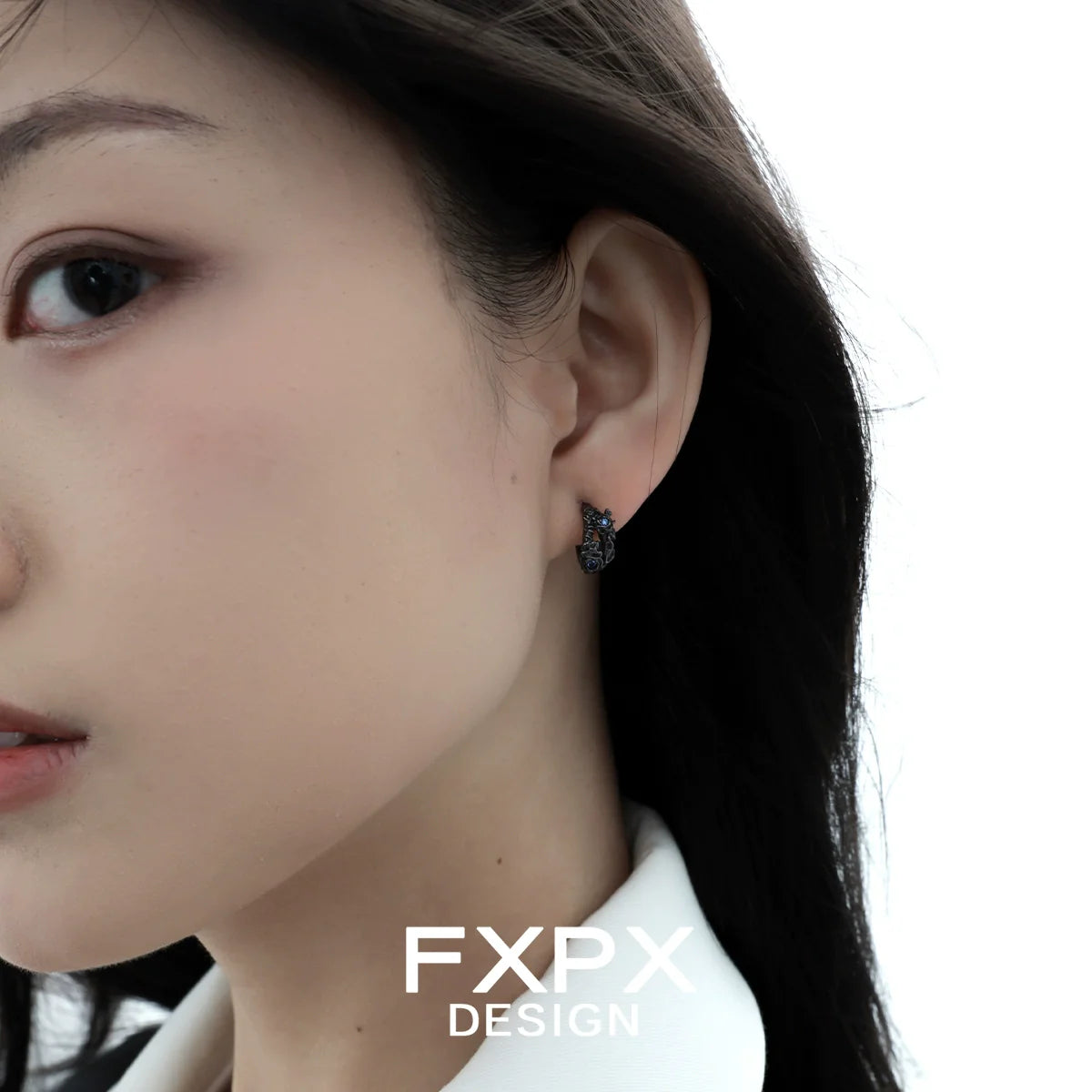 Elegant blue black rose stud earrings showcased on a model, perfect for stylish accessories.