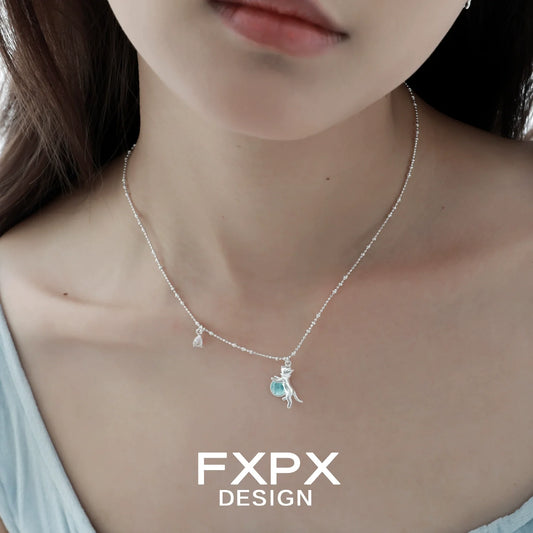 Silver chain with blue cat pendant necklace for a stylish and playful look
