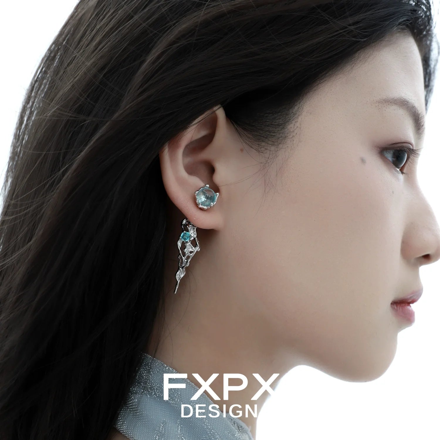Stunning blue glacier earrings by FXPX featuring intricate design and elegant gemstone details