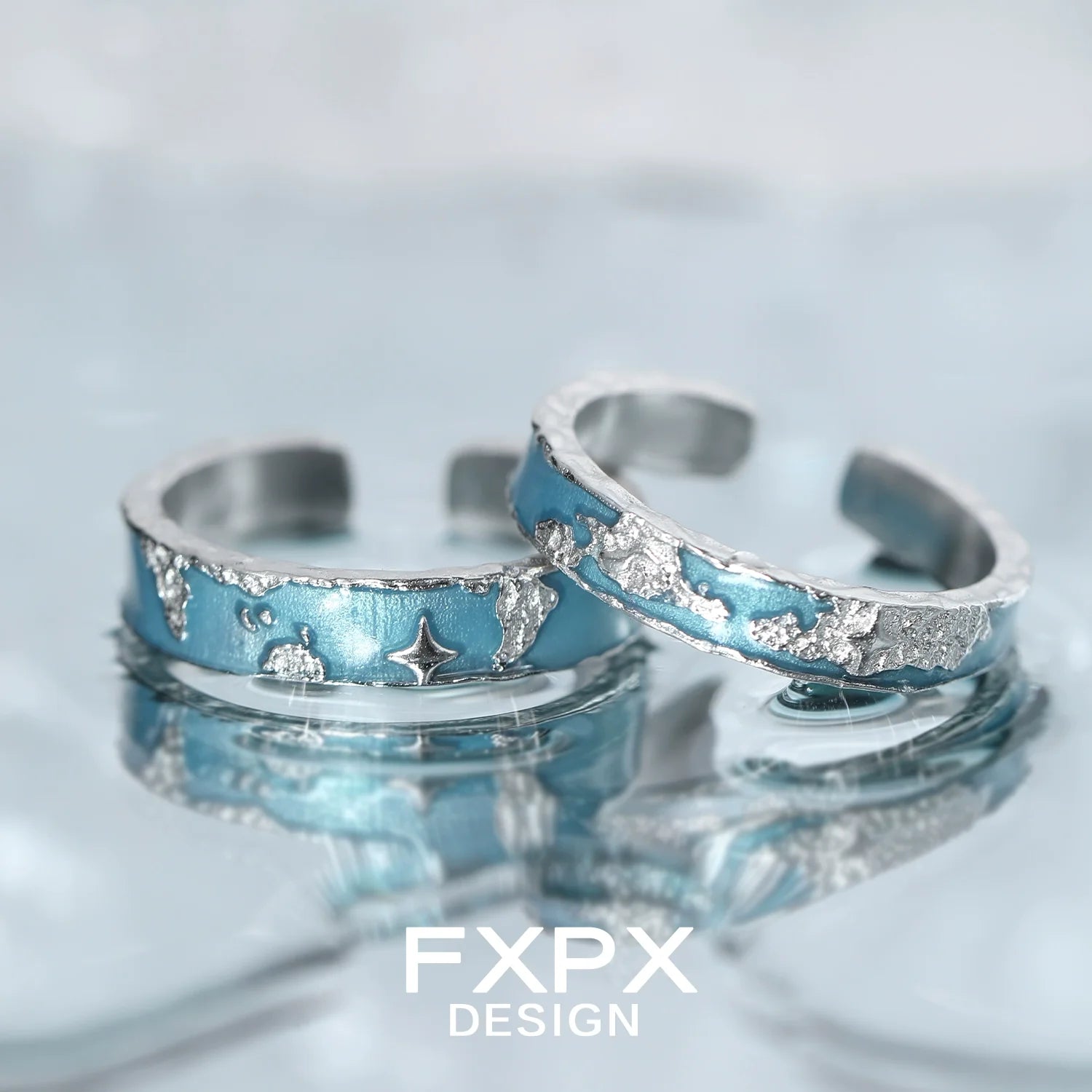FXPX blue planet puzzle ring featuring a unique design and oceanic colors on a silver band