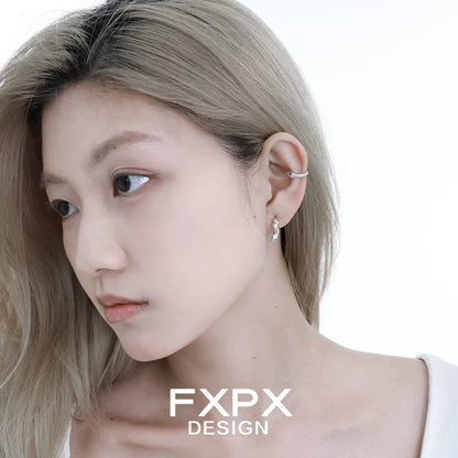 Stylish FXPX blue snake ear cuff worn by a model showcasing its unique design and elegant look
