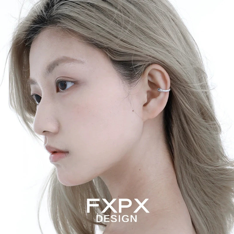 FXPX Blue Snake Ear Cuff elegantly displayed on a model's ear with a sleek design