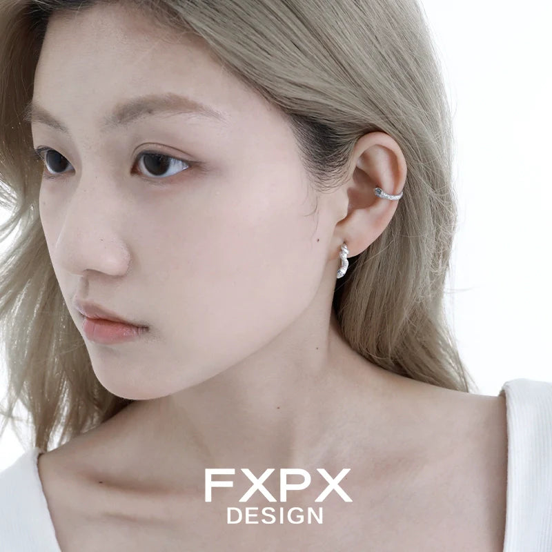 Elegant blue snake ear cuff by FXPX, adding a unique touch to your ear jewelry collection