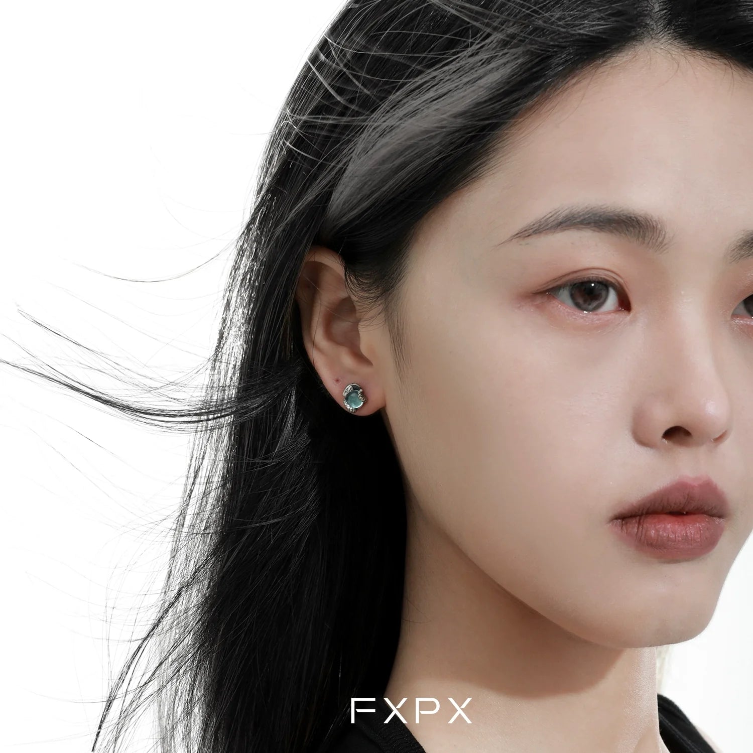 Stylish blue snake stud earrings crafted by FXPX featuring intricate design and vibrant color