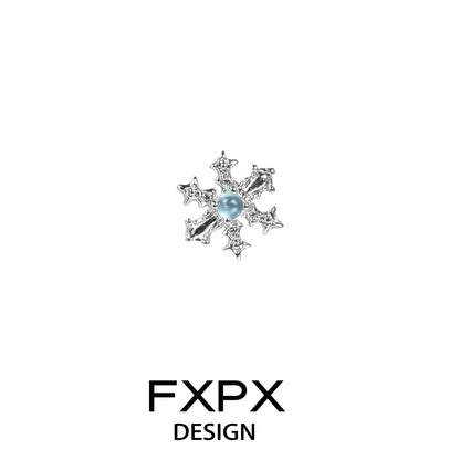 Elegant blue snowflake earrings featuring a central blue stone and sparkling accents