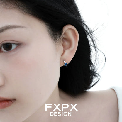 Elegant blue zircon earrings set in sterling silver, ideal for any occasion