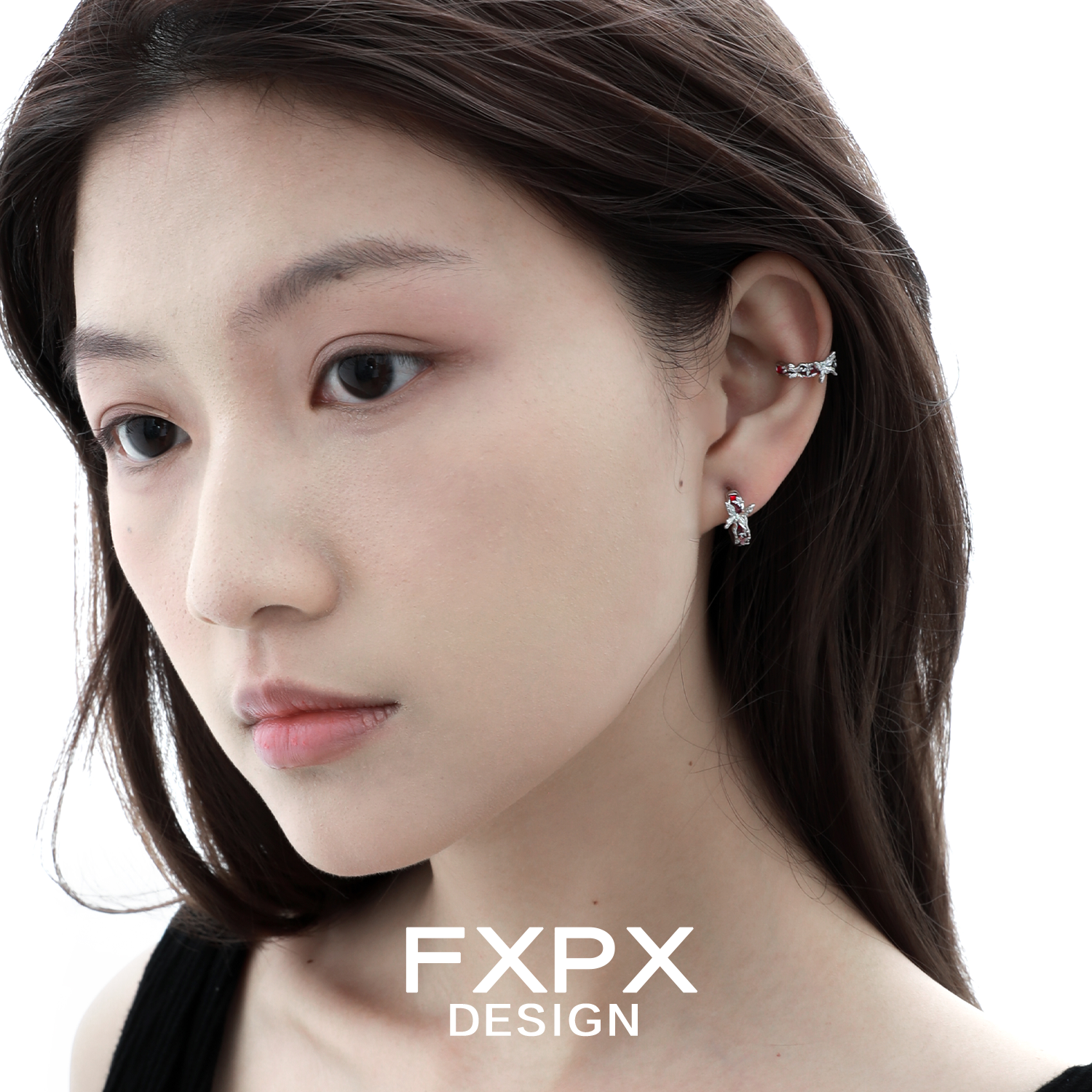 Stylish FXPX butterfly ear cuffs worn by a model showcasing unique design and elegance