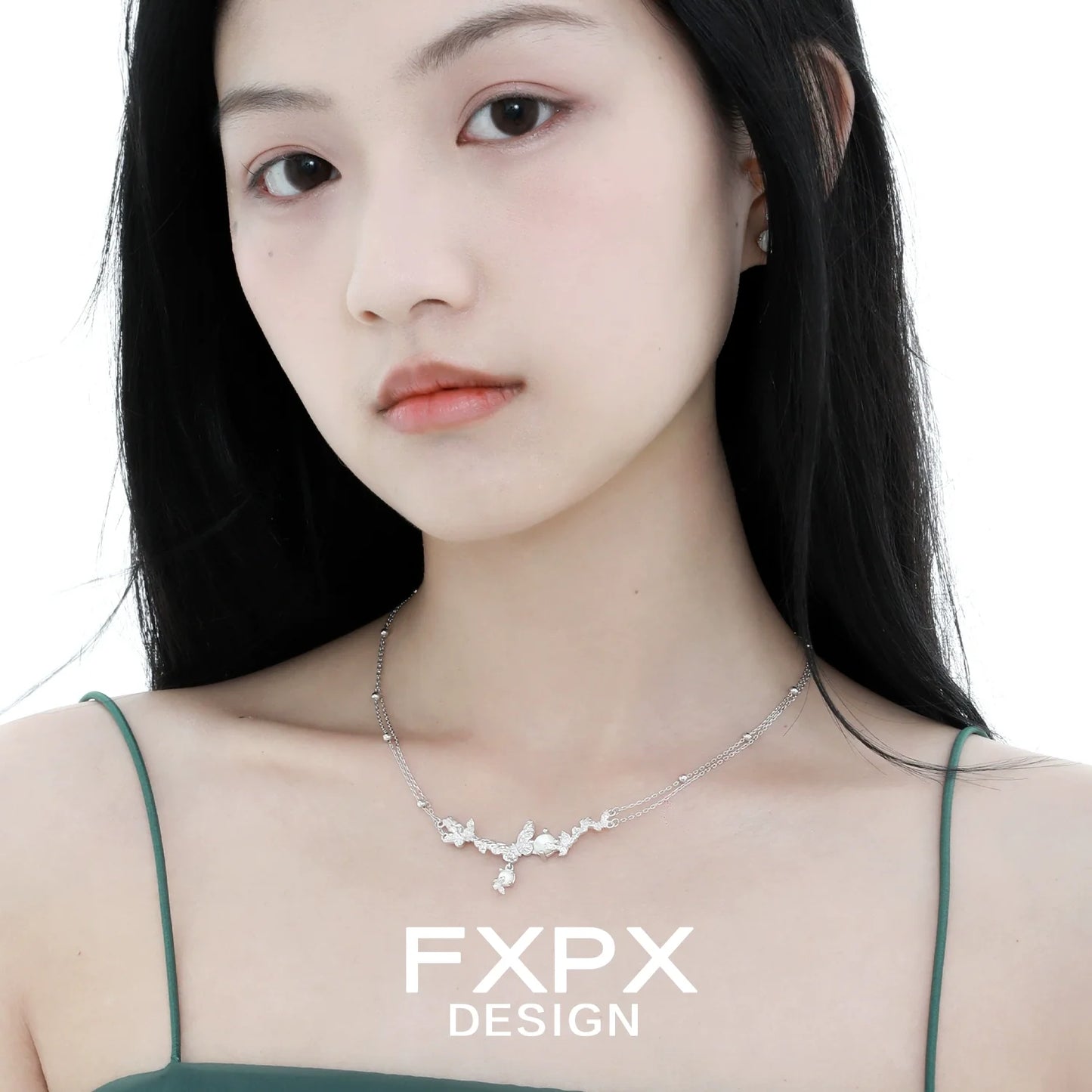 Elegant FXPX butterfly necklace for women featuring a delicate design and silver finish