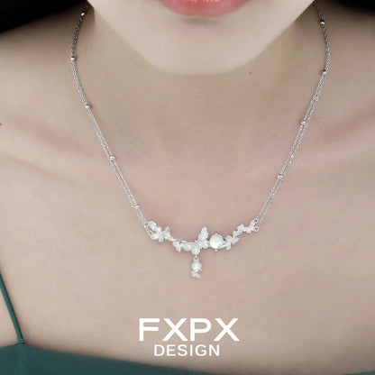 Elegant FXPX butterfly necklace for women featuring a delicate floral design and shimmering details