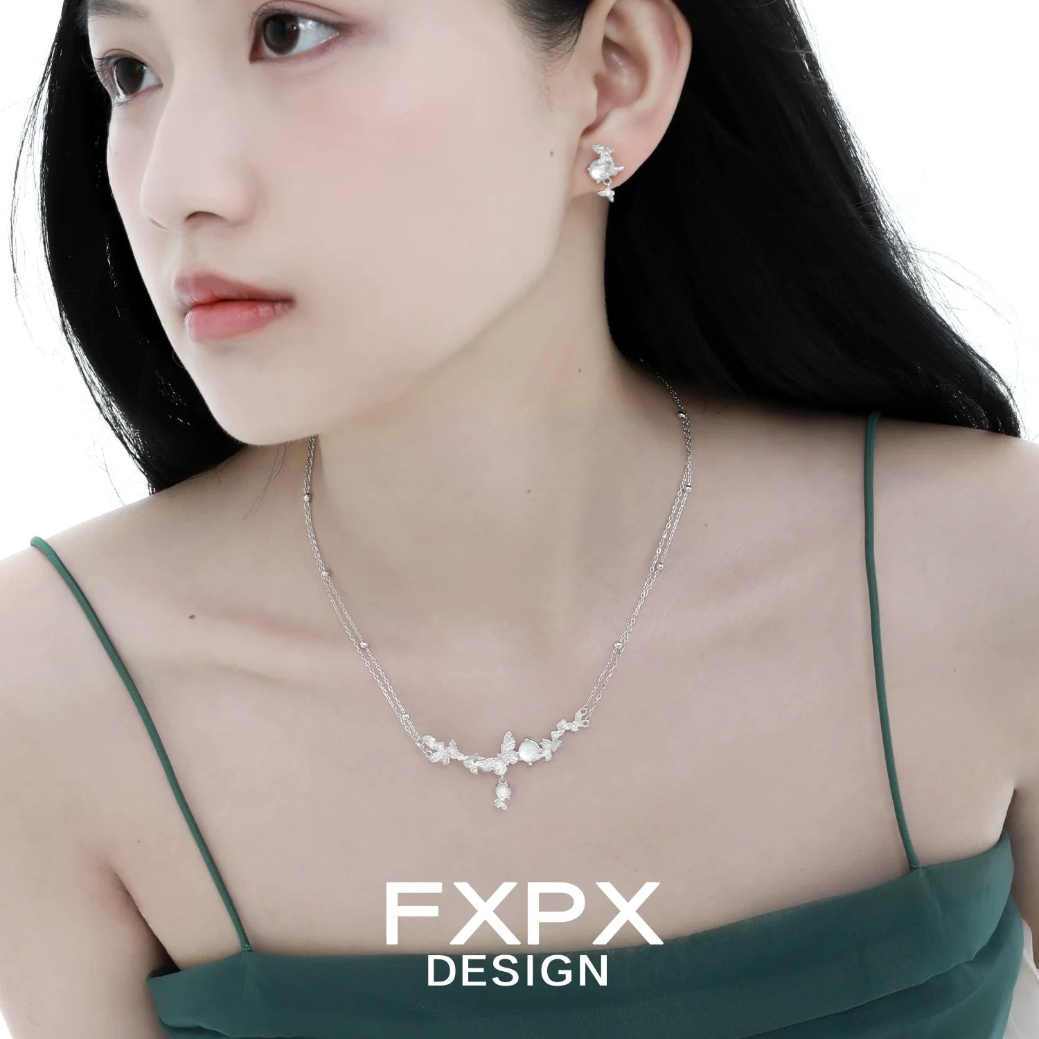 Elegant butterfly pearl earrings by FXPX, perfect for enhancing any outfit with a touch of sophistication
