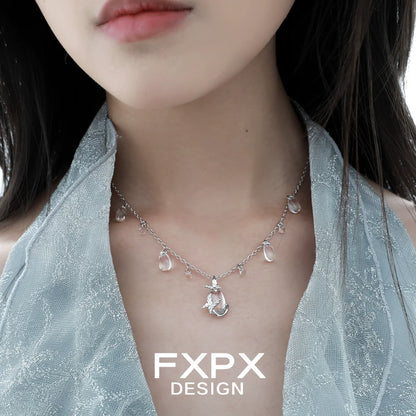 Stylish butterfly water drop silver necklace featuring delicate charms and a shimmering design