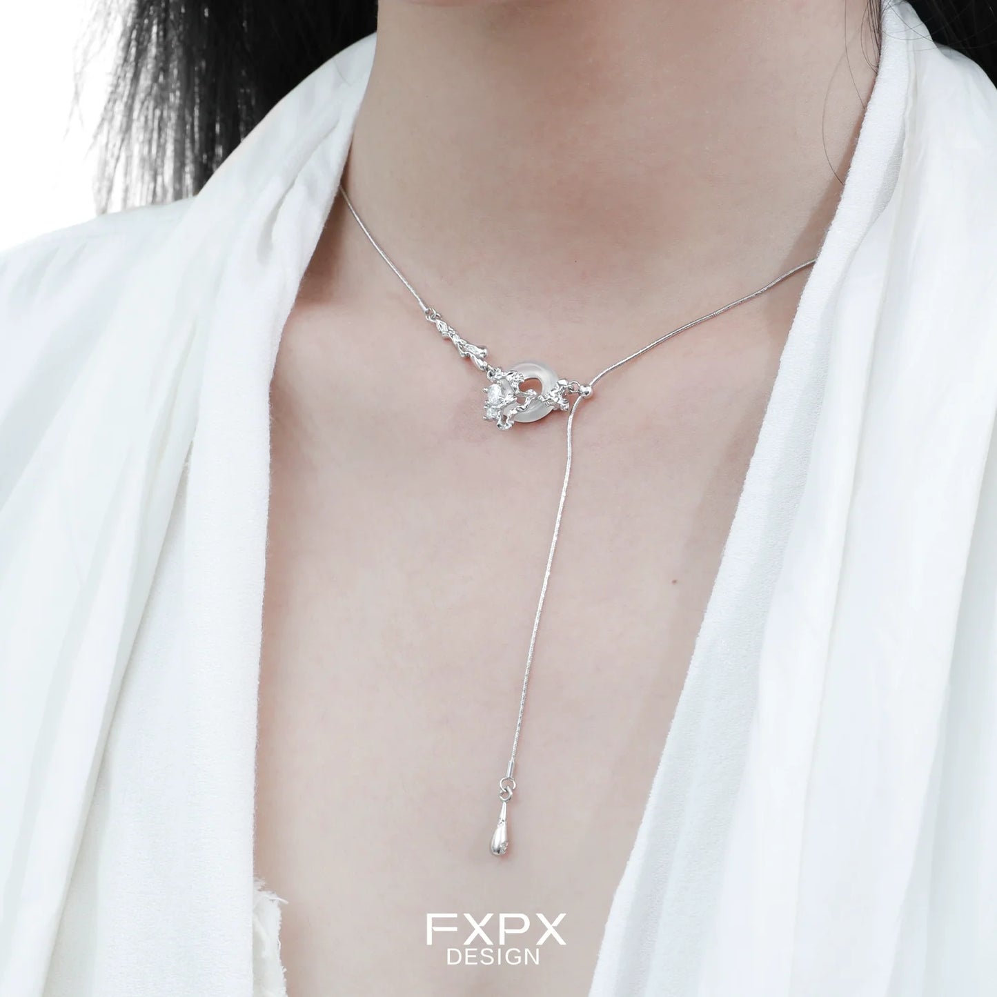 Elegant celestial eclipse agate necklace with a delicate silver chain and unique pendant design