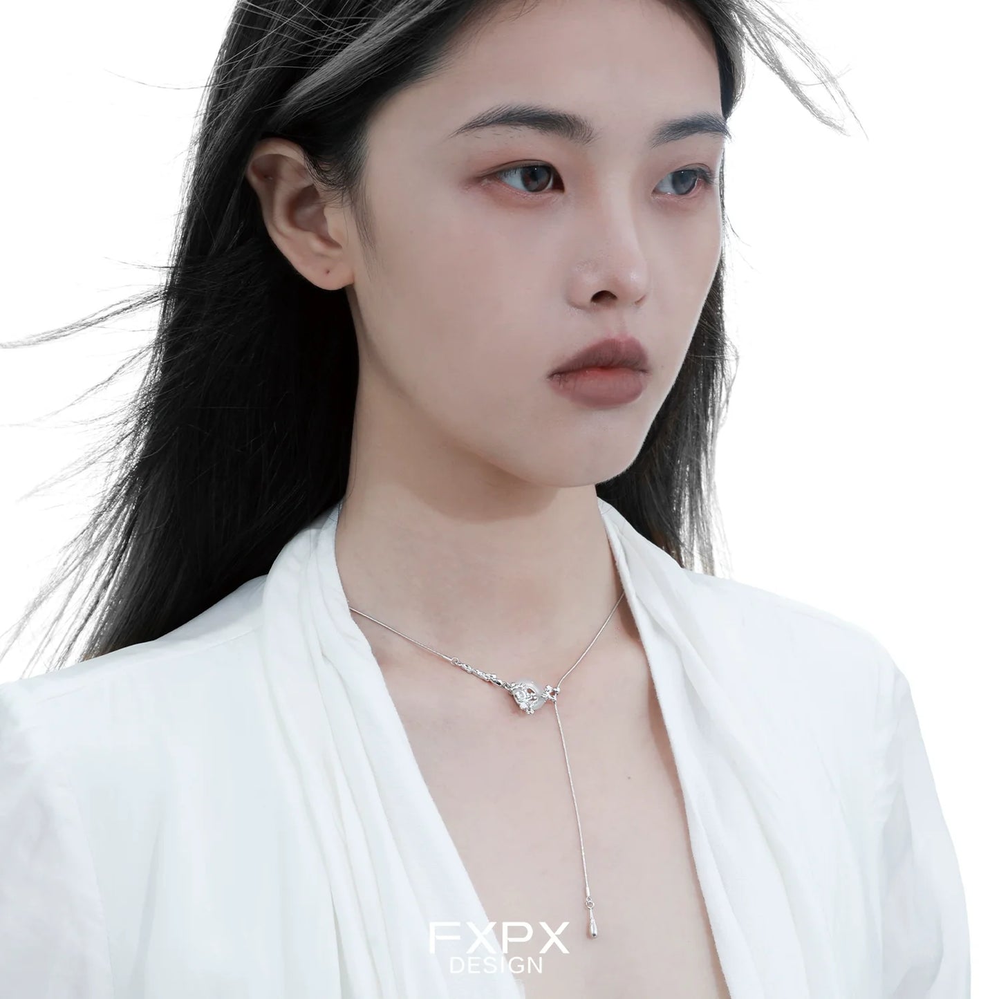 FXPX Celestial Eclipse Agate Necklace elegantly worn on a model with flowing hair