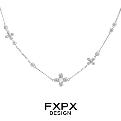 Elegant FXPX cross necklace for women featuring sparkling stones and delicate chain design