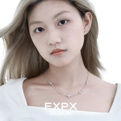 Stylish FXPX cross necklace for women featuring delicate star accents and a silver finish