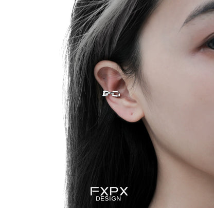 Stylish FXPX cyber mech silver earrings displayed on a model with dark hair