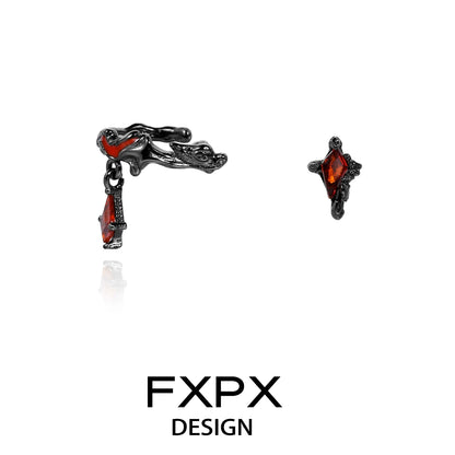 FXPX dark devil heart earrings featuring black metal design and red gemstone accents