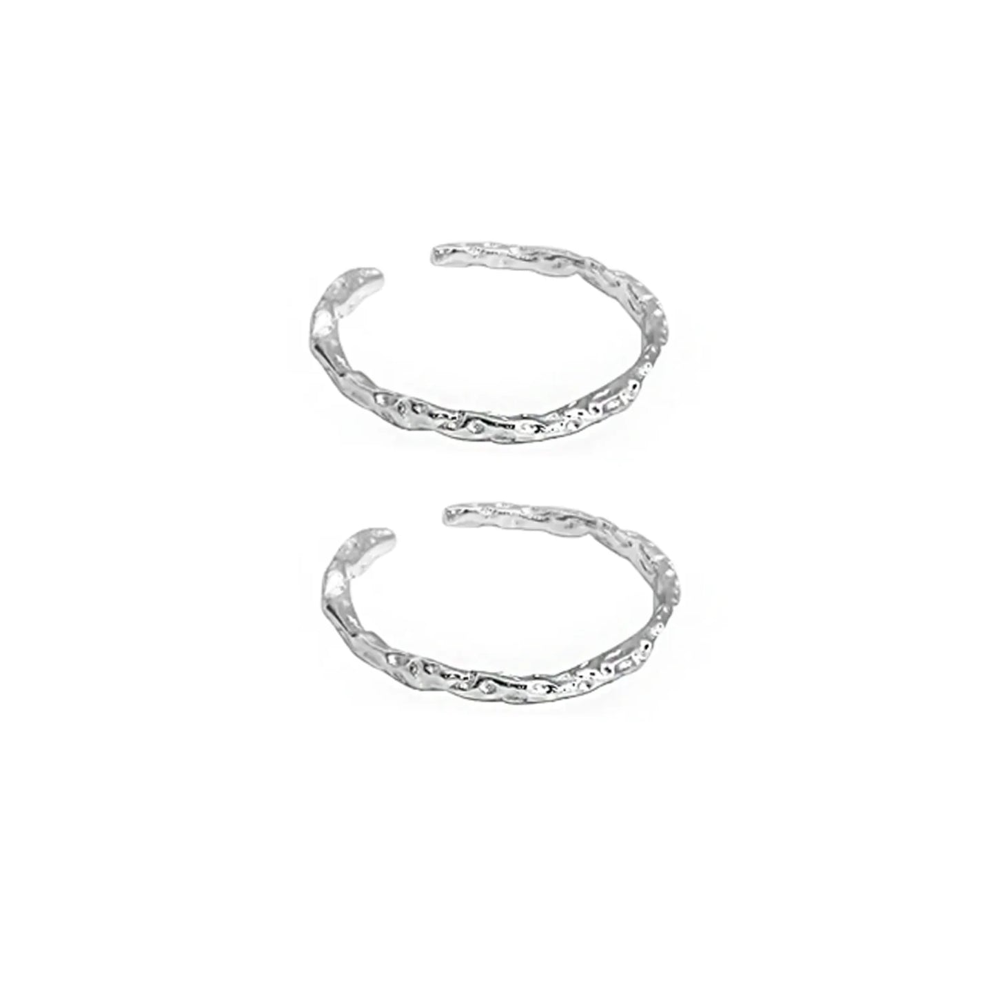Two FXPX minimalist textured thin rings with a unique design in a silver finish