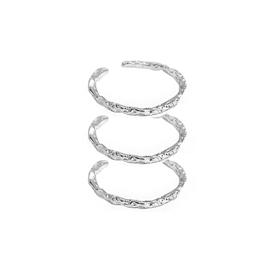 Set of three FXPX minimalist textured thin rings designed for elegant stacking or solo wear