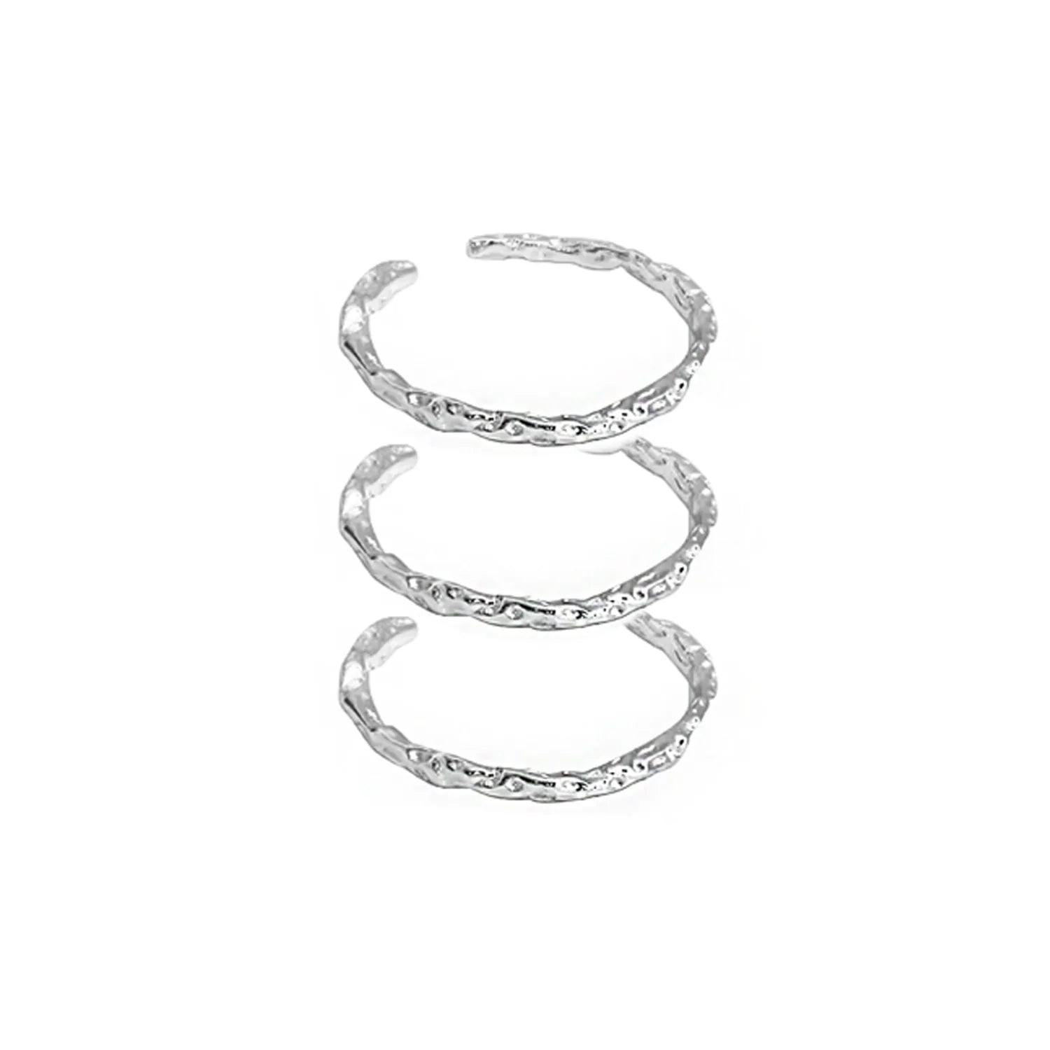 Set of three FXPX minimalist textured thin rings designed for elegant stacking or solo wear