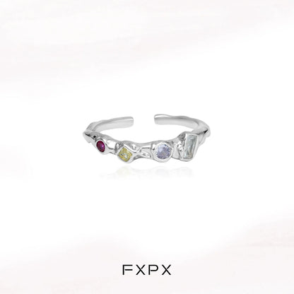 FXPX dopamine colored zircon ring with unique gemstone arrangement and modern design
