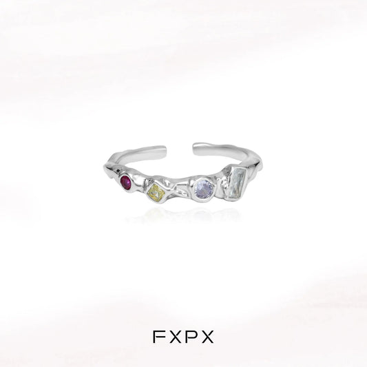 FXPX dopamine colored zircon ring with unique gemstone arrangement and modern design