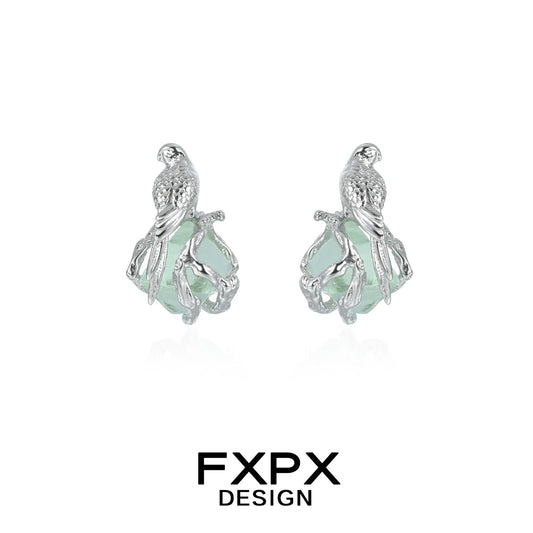 Silver FXPX flying bird fluorite earrings with detailed bird design and elegant gemstone setting