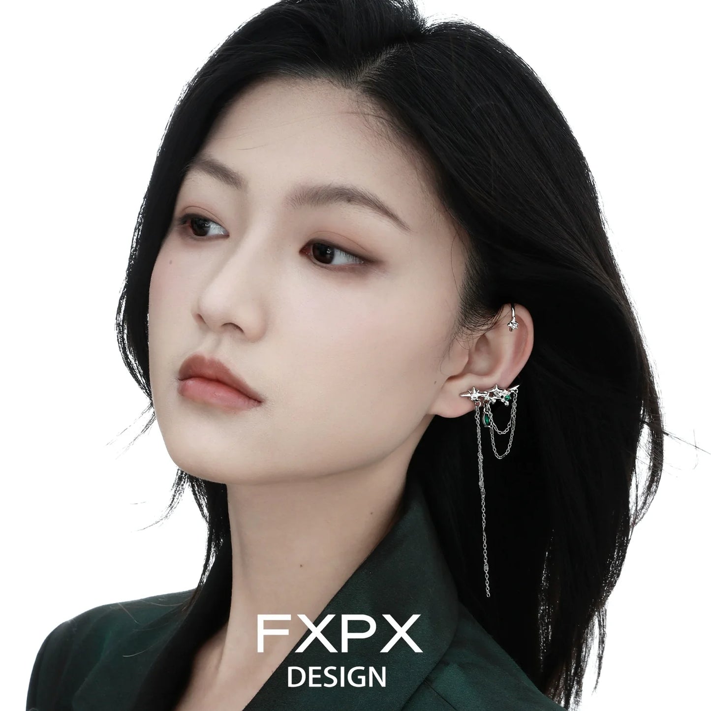 Elegant model wearing FXPX forest star ear cuff with delicate chain detail for a stylish look