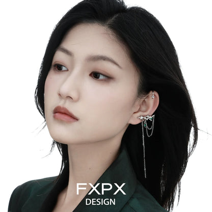 Elegant model wearing FXPX forest star ear cuff with delicate chain detail for a stylish look