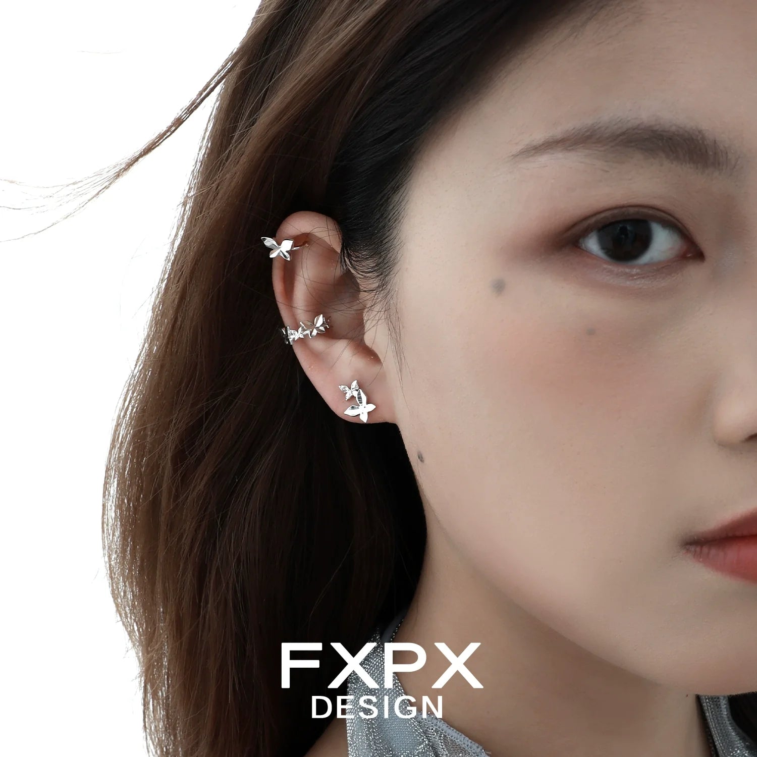 FXPX futuristic butterfly ear cuff showcasing a stylish design worn on the ear