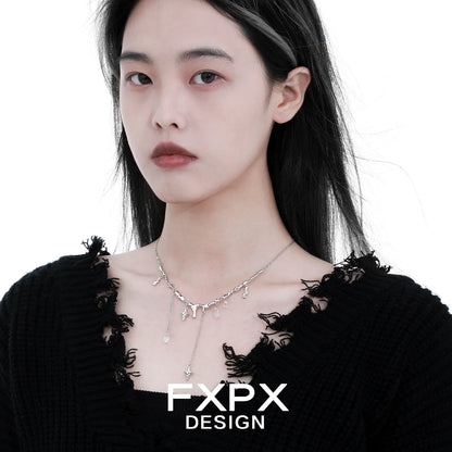 FXPX Galactic Meteor Tassel Necklace featuring shimmering tassels and a modern design.