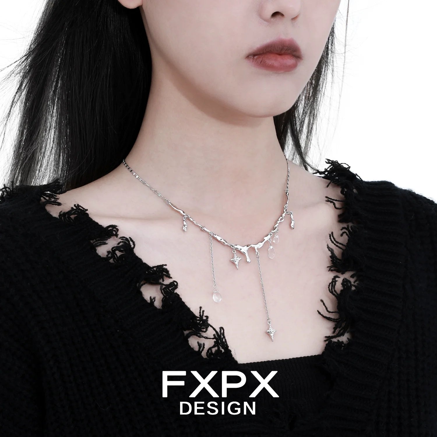 FXPX Galactic Meteor Tassel Necklace with Silver Chains and Star Accents on a Model