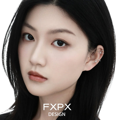 Geometric orbit ear clip by FXPX worn by a model showcasing its unique design