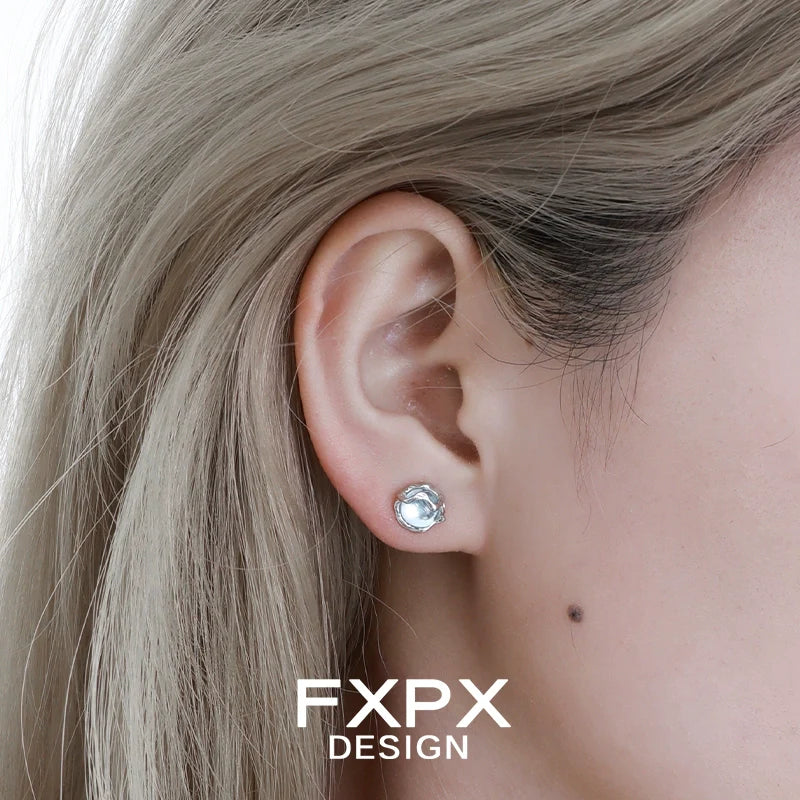 Elegant FXPX glacier drop earrings featuring a sparkling gem for a chic look